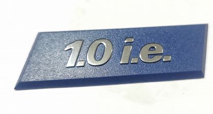 Emblemat  "1.0 i.e." Uno Fiat