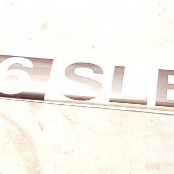 Emblemat "1.6 SLE" PN Caro