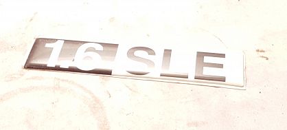 Emblemat "1.6 SLE" PN Caro