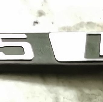 Emblemat  "1.5 L" PN ST FSO